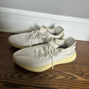 White GOAT verified Yeezy 350 sneakers. Excellent condition. Worn lightly.